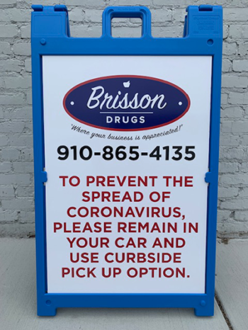 Brisson Drugs' sign for COVID-19 effort